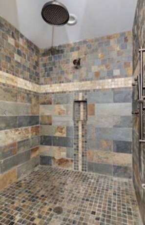 Bathtub, hair dryer, towels, soap