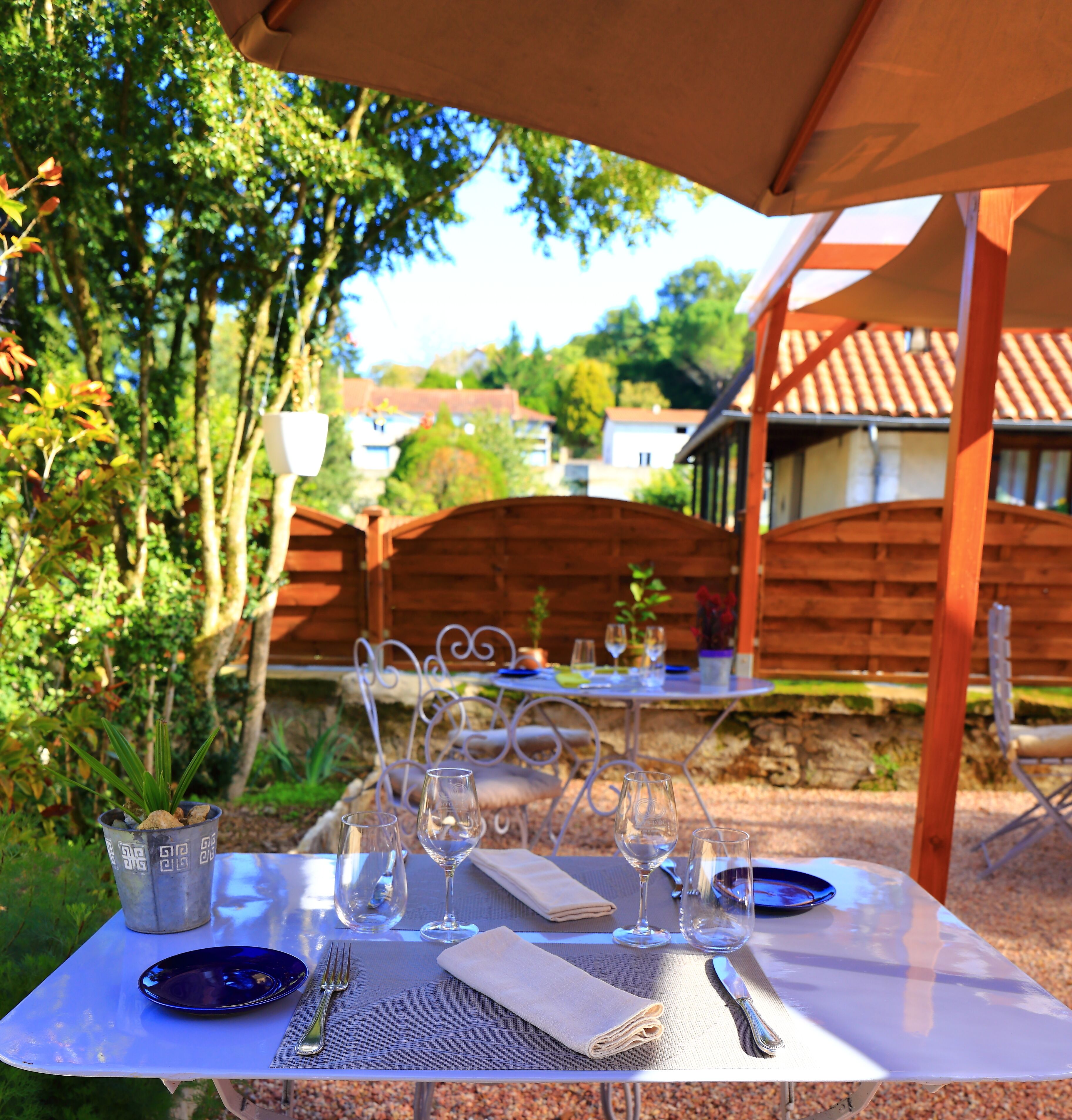 Breakfast, lunch, dinner served; Fusion cuisine, garden views 
