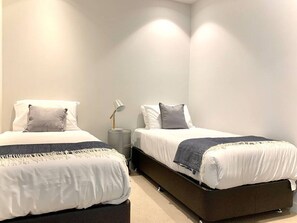 3 bedrooms, desk, iron/ironing board, travel cot