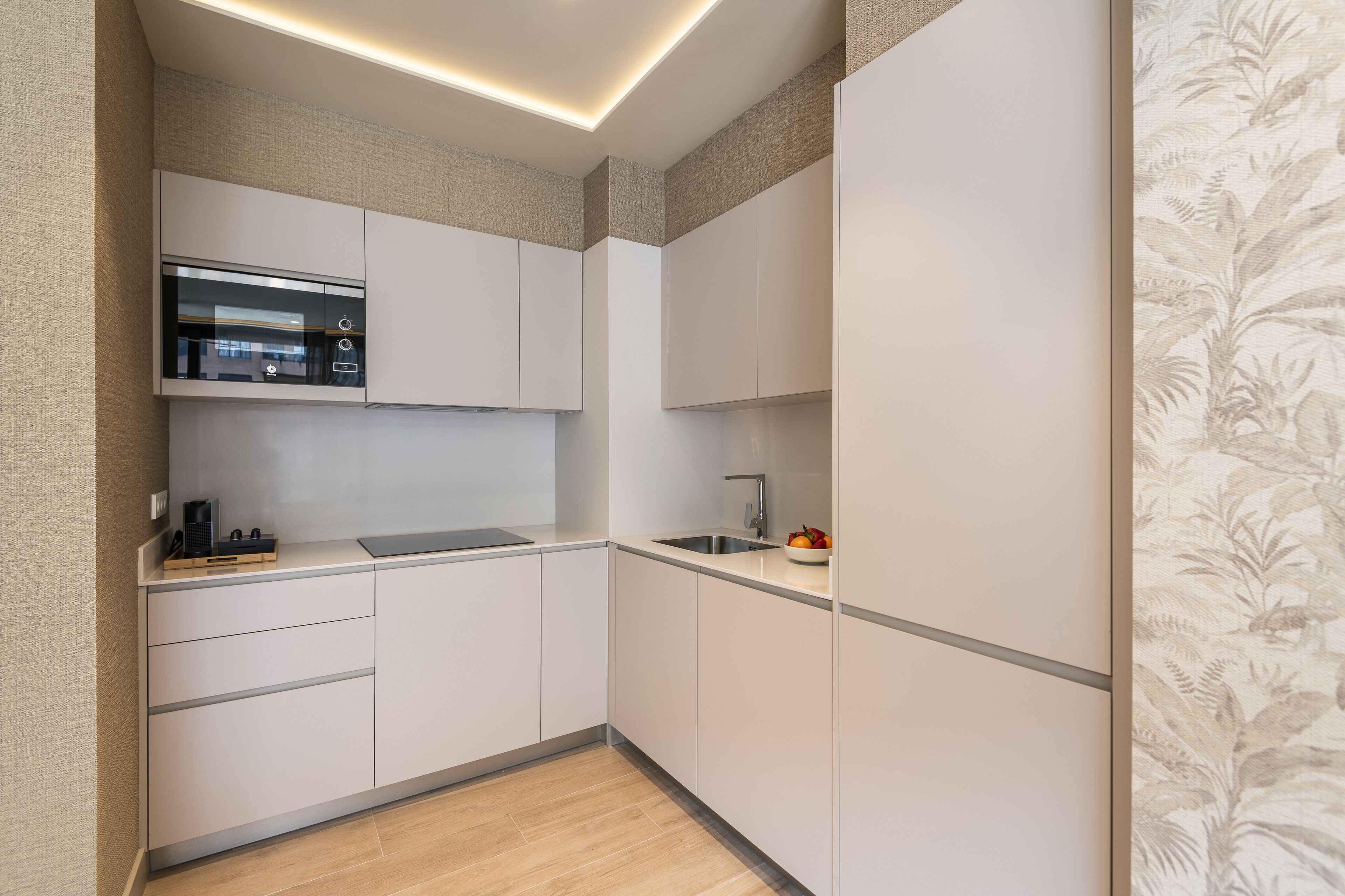 full-sized fridge, microwave, stovetop, dishwasher