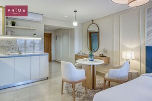 Deluxe Studio, River View | Living area | TV -  Prime Residence Arkadia (Cairo)