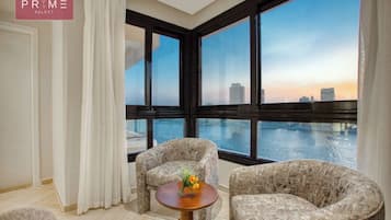 Superior Apartment, River View | Living area | TV