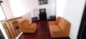 Classic Townhome | Living area | 32-inch LED TV with cable channels, TV - Casa del Tanque (Antigua Guatemala)