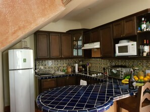 Klassieke resortwoning | Privékeuken | Een magnetron, een oven