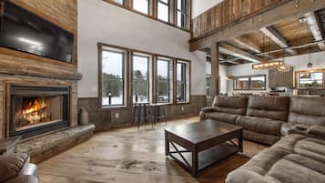 Smart TV, chimenea, reproductor de DVD y futbolito