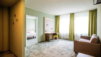 Junior Suite | 1 bedroom, desk, free WiFi, bed sheets