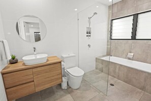 Bathtub, hair dryer, towels