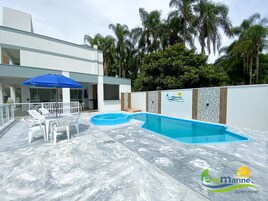 Outdoor pool, open 9:00 AM to 10:00 PM, pool umbrellas, sun loungers