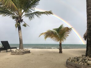On the beach, sun loungers, beach towels - JJEM Cabanas (Placencia)