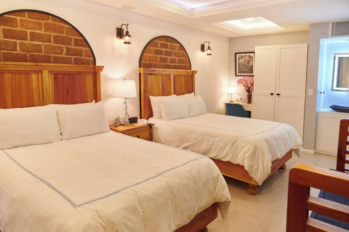 Premium bedding, pillow-top beds, in-room safe, desk