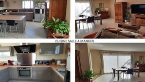 A kitchen with a dining area, a living room, and a separate dining room. - To complete (Aramon)