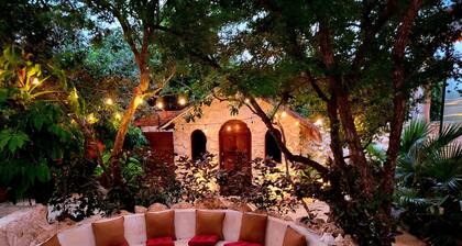 This home features lush garden & private pool.