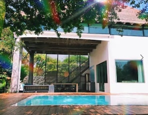 Outdoor pool - This home features lush garden & private pool. (Isla mujeres)
