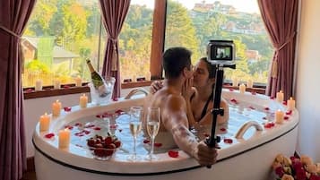 Premium bedding, down comforters, pillowtop beds, minibar