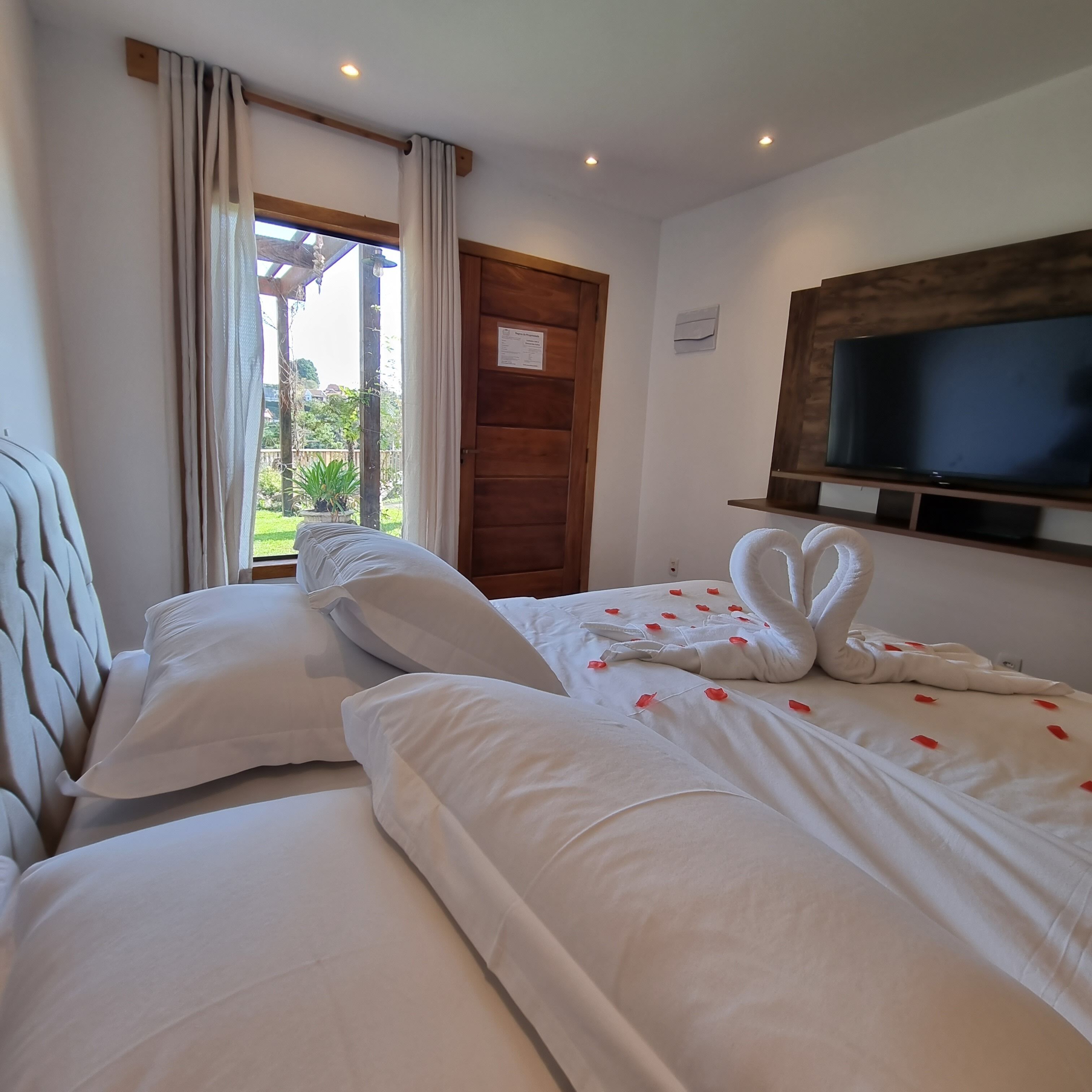 Premium bedding, down comforters, pillowtop beds, minibar