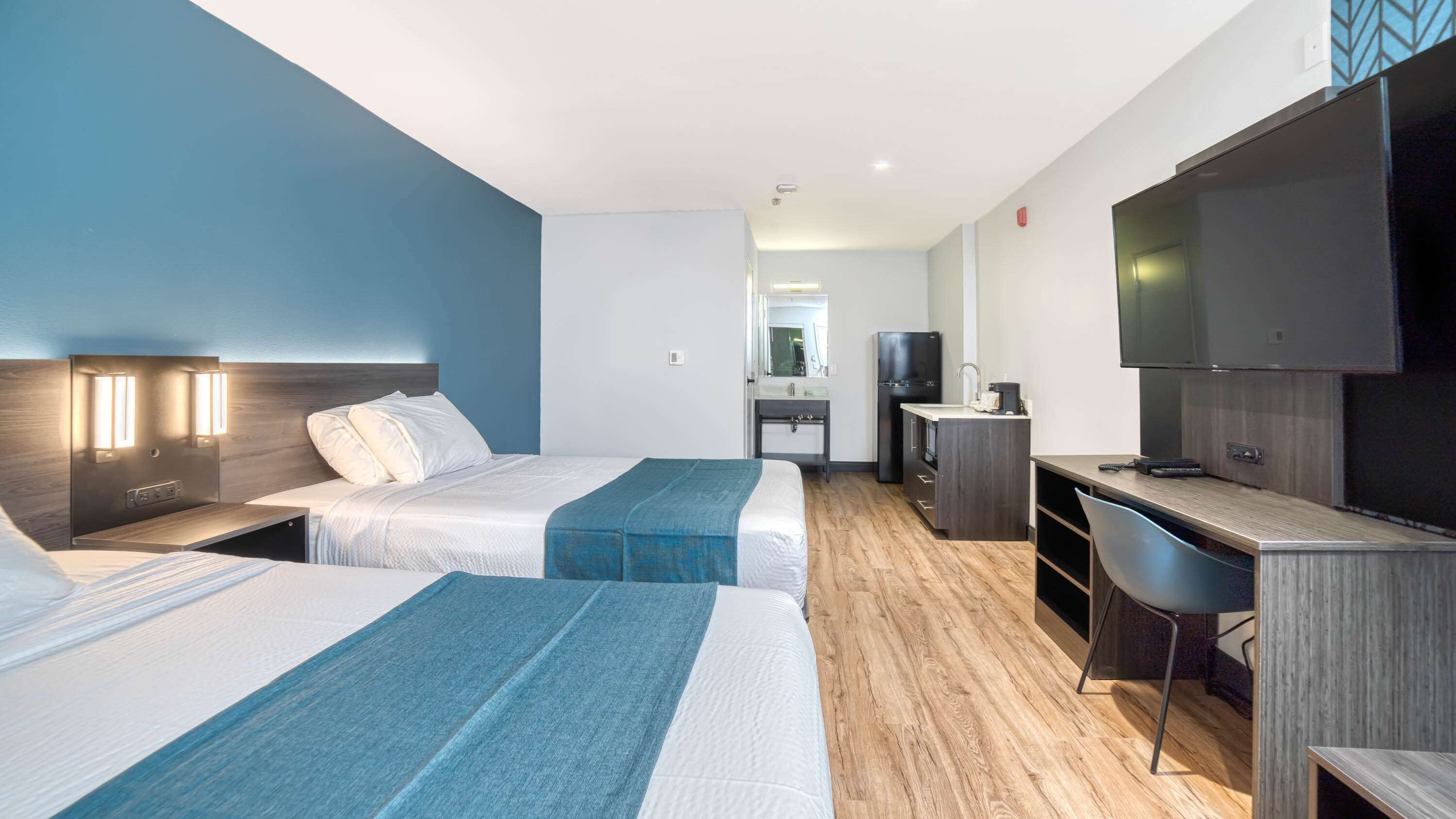 Premium bedding, Select Comfort beds, desk, iron/ironing board