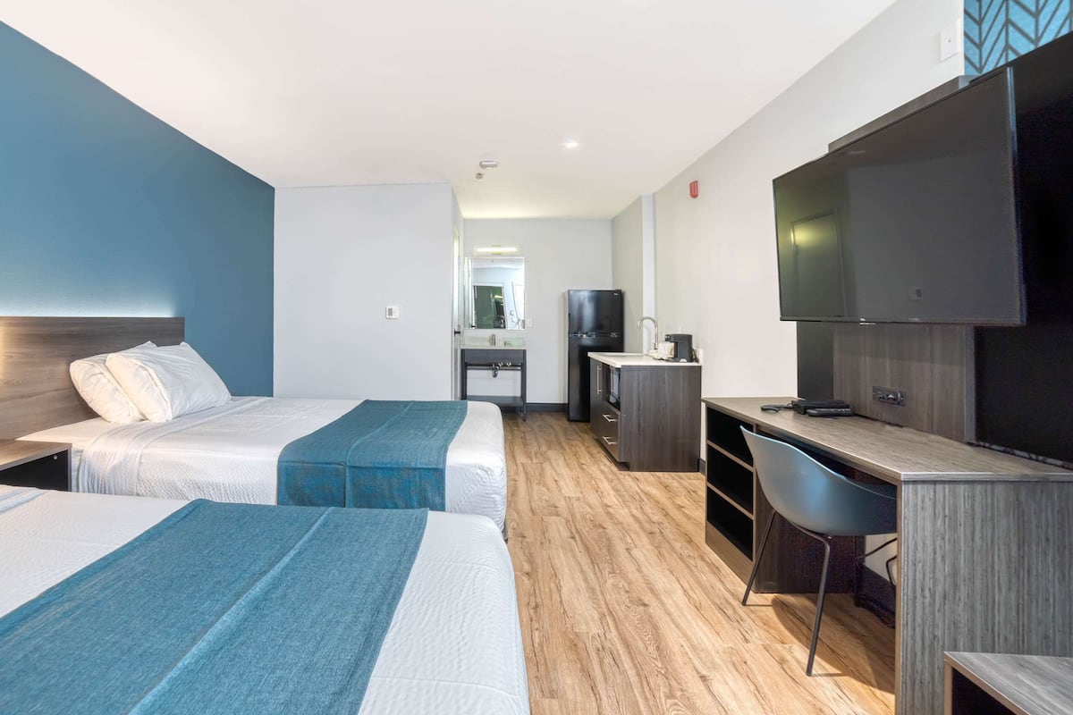 Premium bedding, Select Comfort beds, desk, iron/ironing board