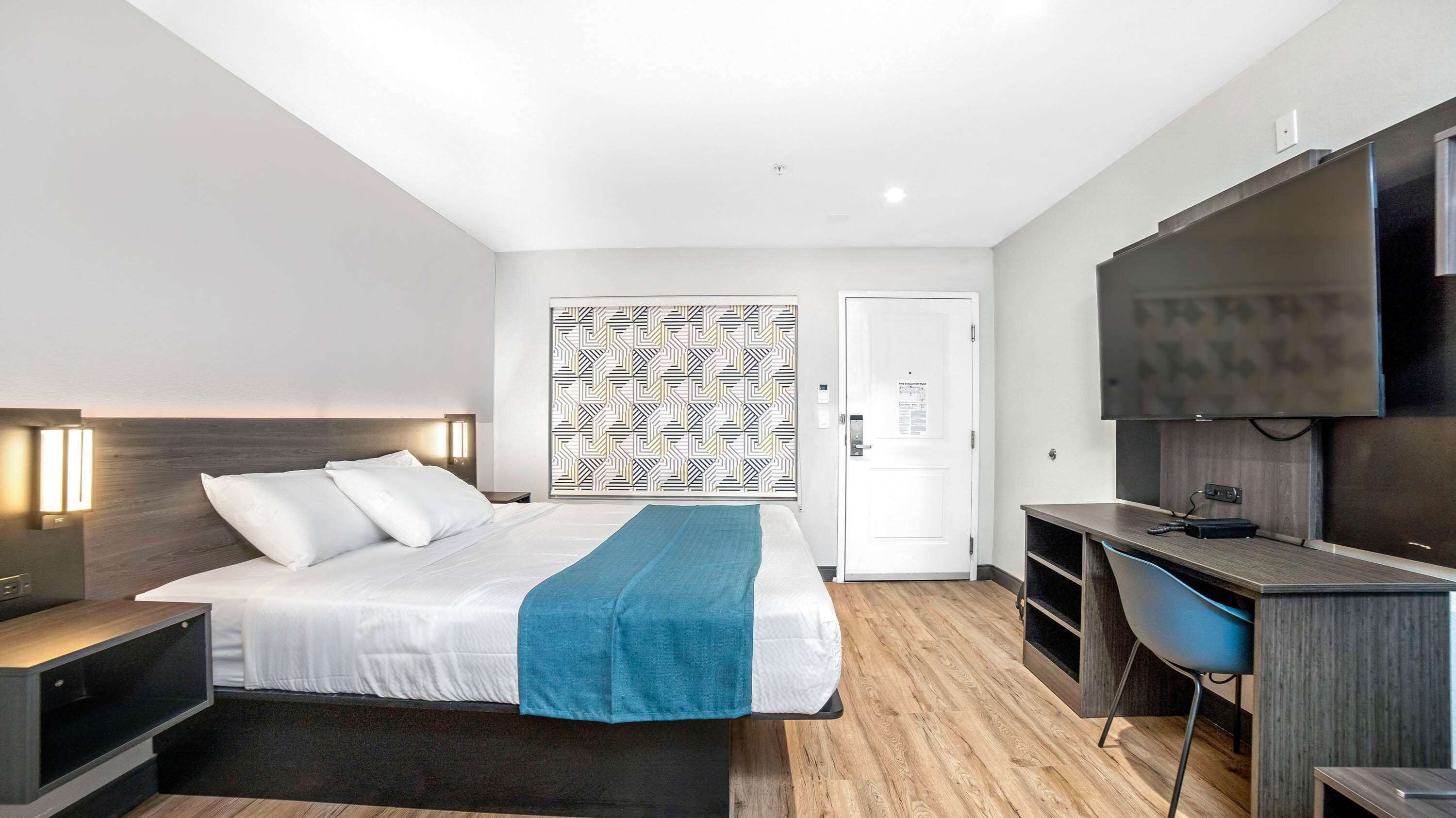 Premium bedding, Select Comfort beds, desk, iron/ironing board