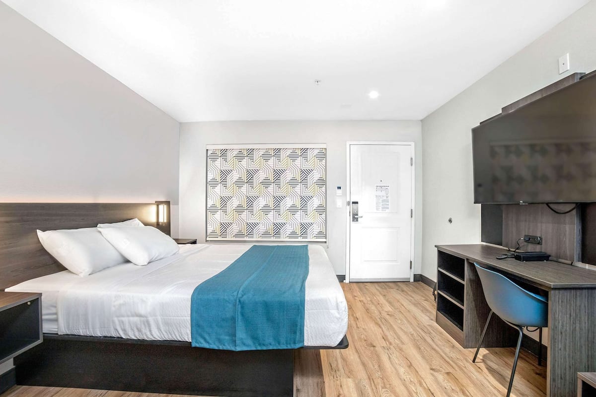 Premium bedding, Select Comfort beds, desk, iron/ironing board