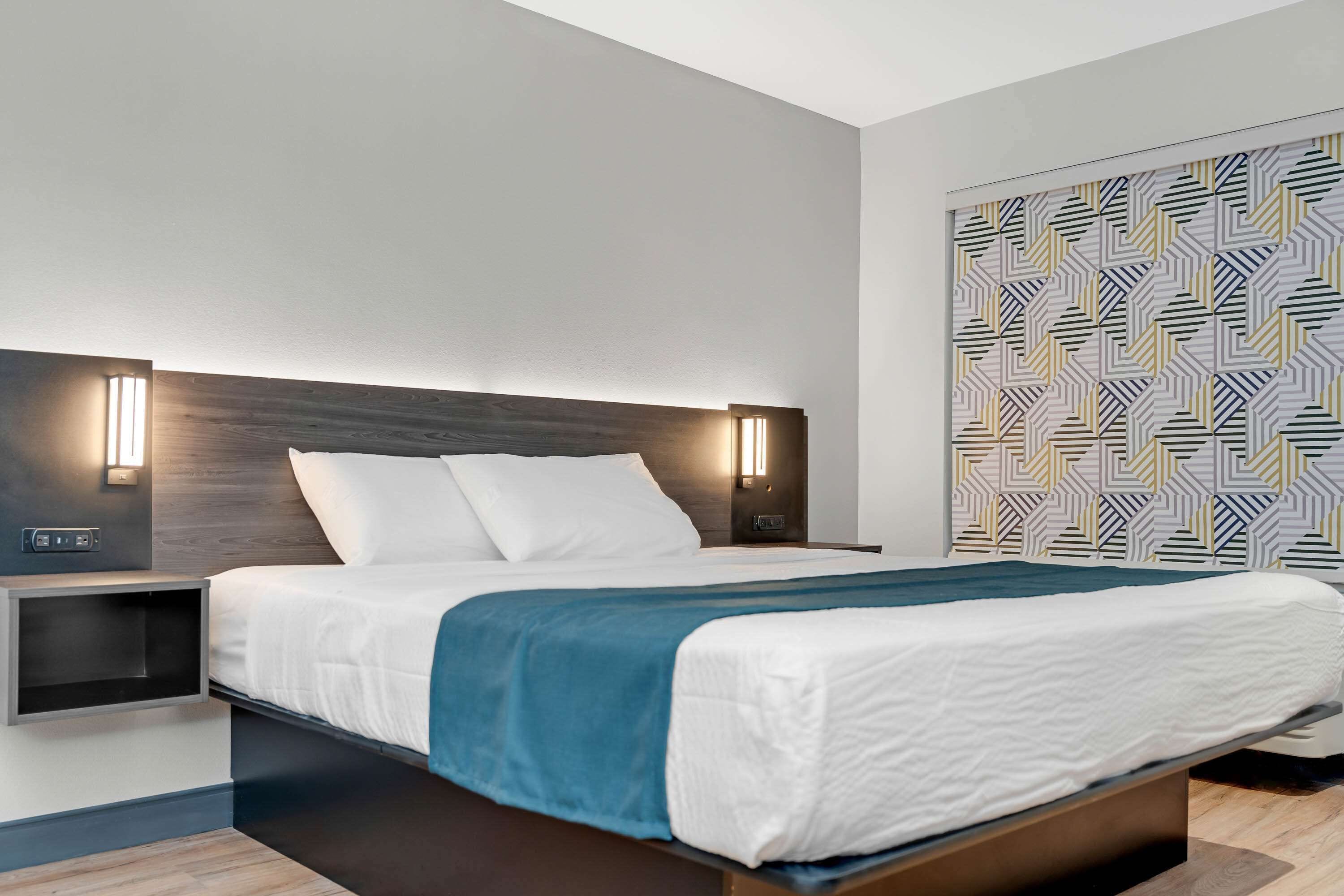 Premium bedding, Select Comfort beds, desk, iron/ironing board