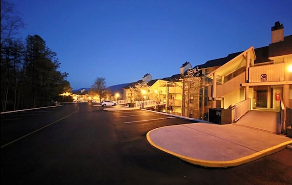 Stroll through a charming neighborhood with a mix of residential and commercial buildings.
