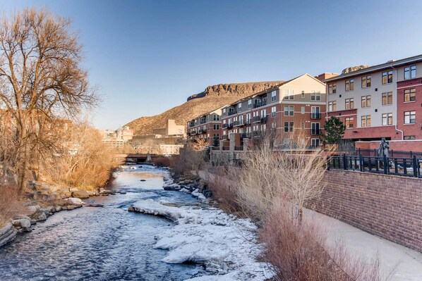 Stunning river views from a peaceful riverside setting, surrounded by a mix of architectural styles.
