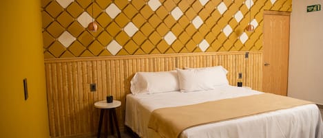 Premium Room, 1 King Bed | 1 bedroom, down comforters, individually decorated, free WiFi