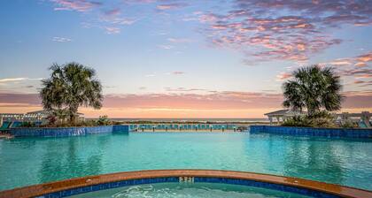STUNNING BEACHFRONT WITH TRIPLE WATER VIEWS OF OCEAN, LAKE, BAY!