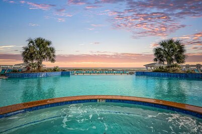 STUNNING BEACHFRONT WITH TRIPLE WATER VIEWS OF OCEAN, LAKE, BAY!