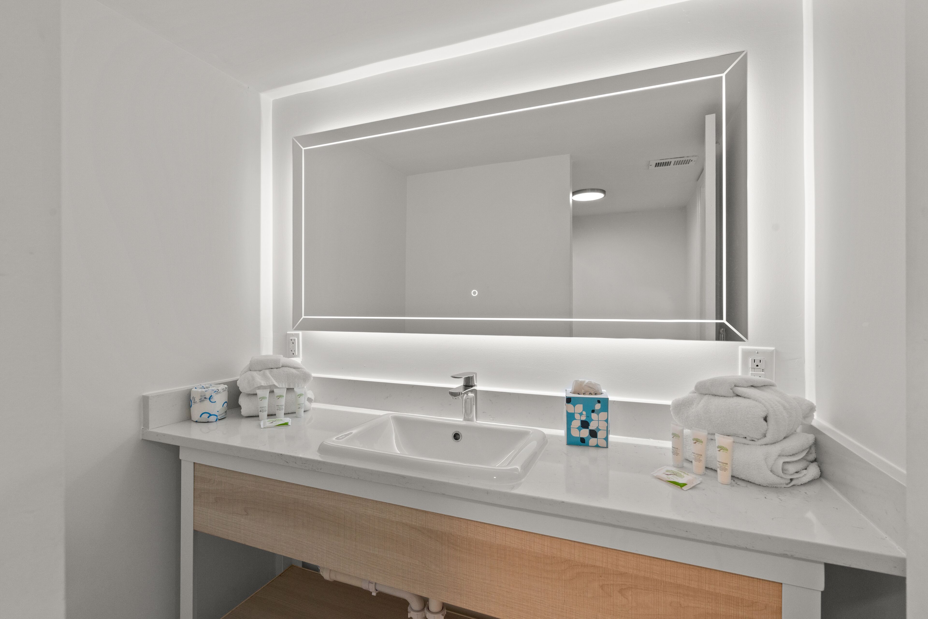 shower, rainfall showerhead, hair dryer, towels