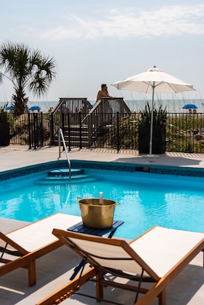 Outdoor pool, open 8:00 AM to 11:00 PM, pool loungers