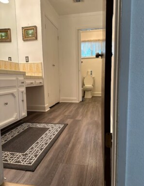 Bathtub, hair dryer, towels, soap