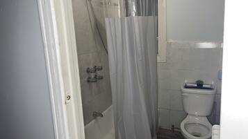 Combined shower/tub