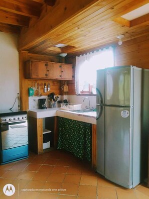 Oven, coffee/tea maker, coffee grinder, cookware/dishes/utensils