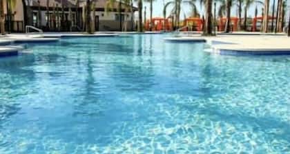 Minutes from Disney! Clean family size Townhouse with a private pool.