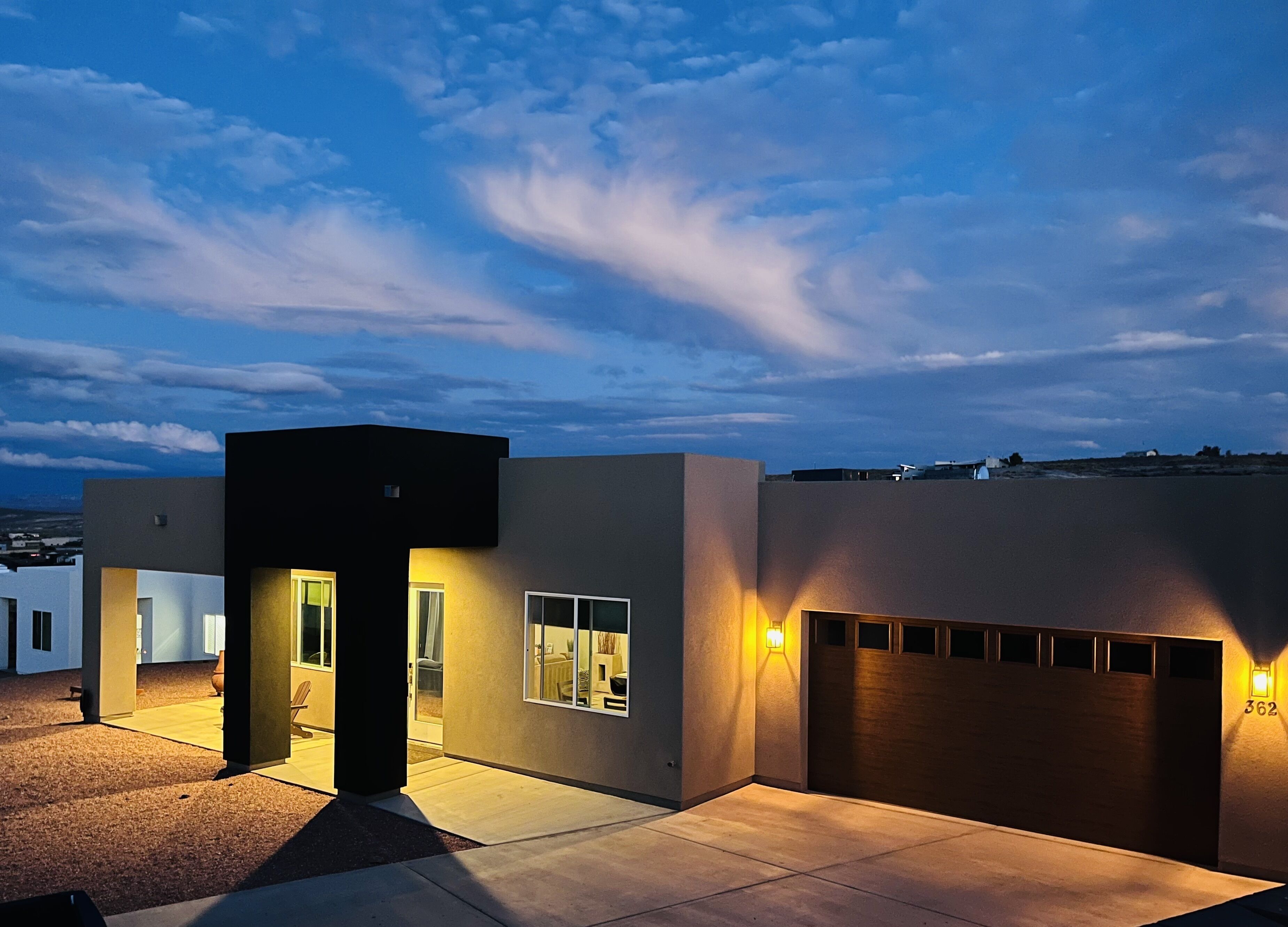 Exterior of the house with a beautiful sky at dusk