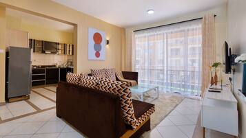 Apartment, 2 Bedrooms | Living area | TV