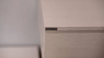 A close-up of a wall with a label reading "LIVART®".