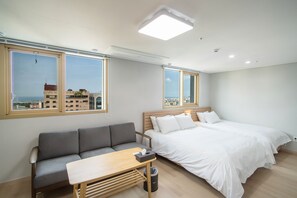 Family Room for 3 persons | Down comforters, pillowtop beds, desk, laptop workspace