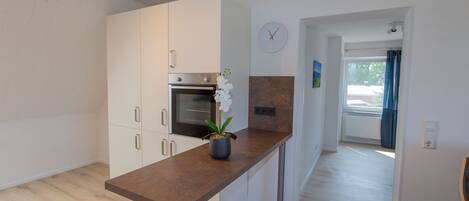 Réfrigérateur, four, plaque de cuisson, lave-vaisselle