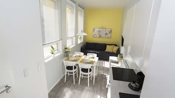 Economy Studio | Living area | Flat-screen TV