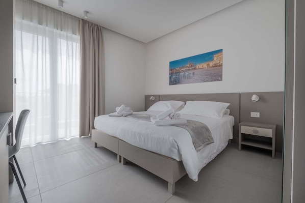 Premium bedding, down duvets, minibar, in-room safe
