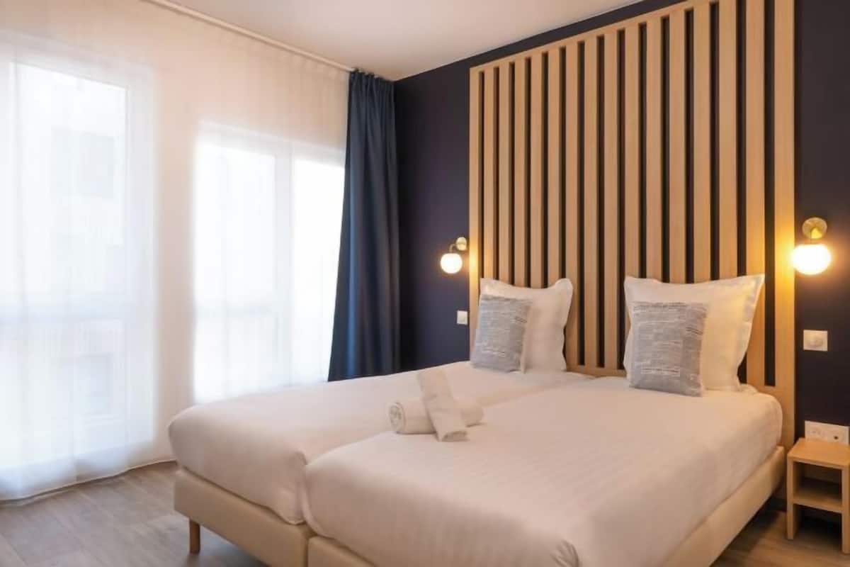 1 chambre, literie de qualité supérieure, décoration personnalisée