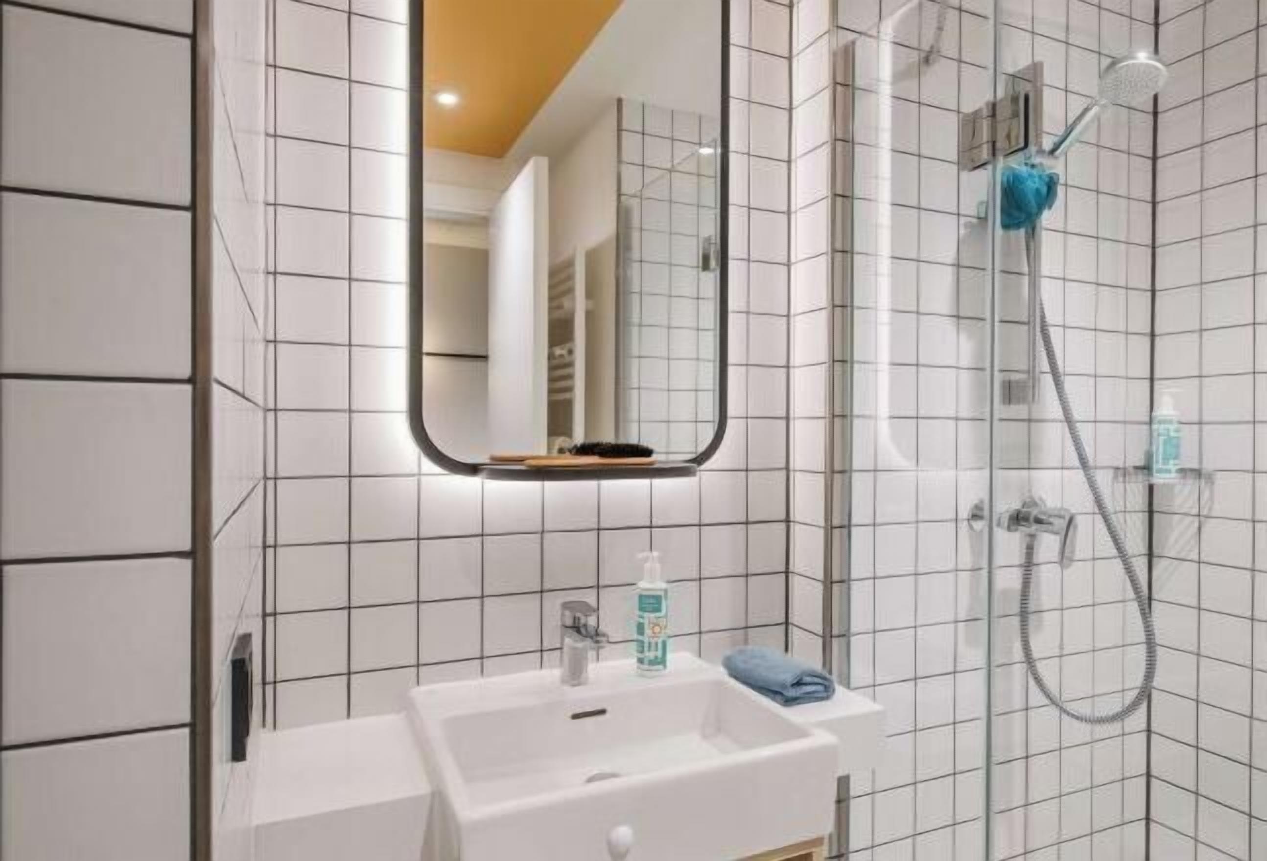 Bathroom | Shower, hydromassage showerhead, eco-friendly toiletries, hair dryer