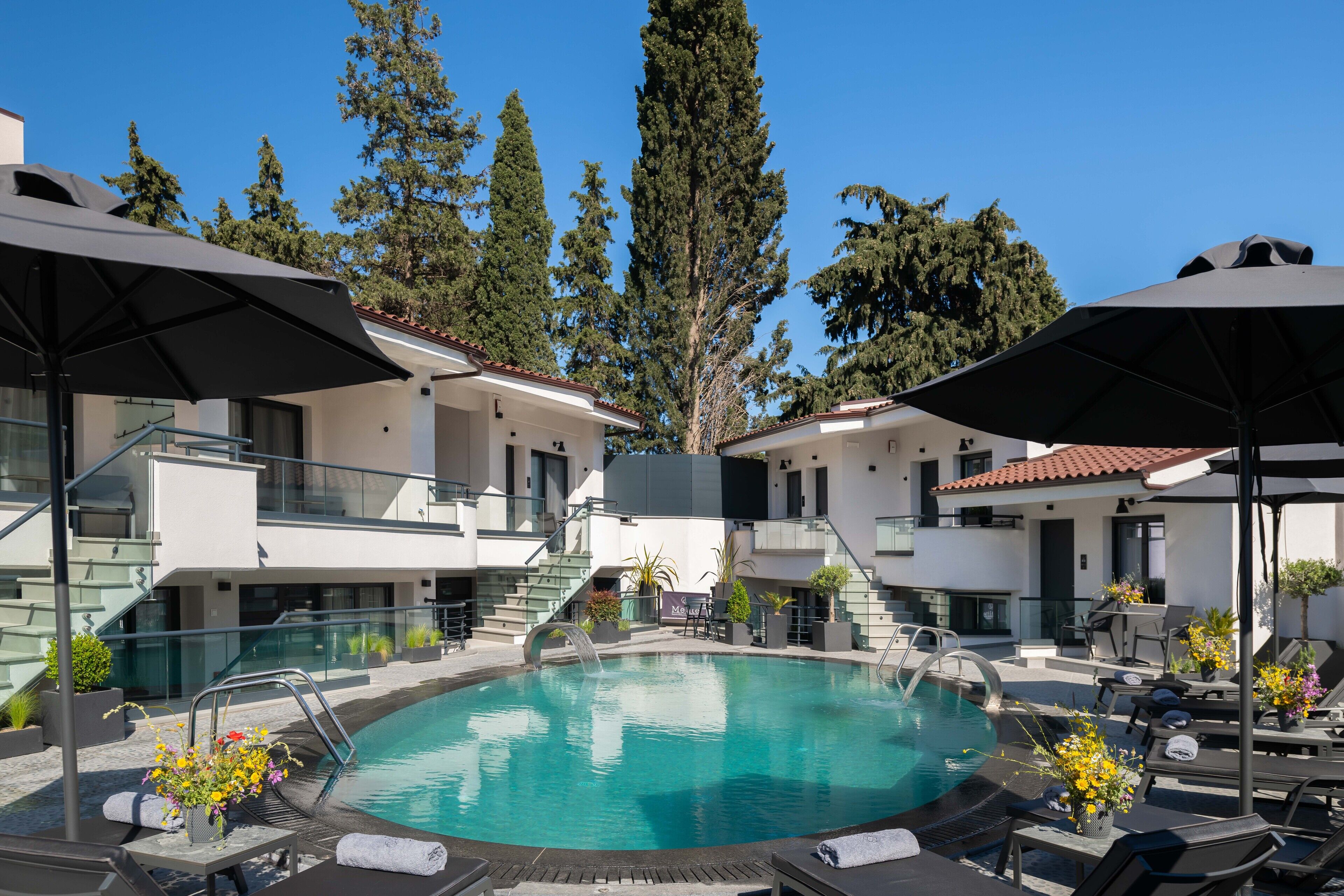 Seasonal outdoor pool, pool umbrellas, pool loungers