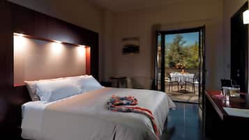 Suíte júnior, terraço | Cofres nos quartos, cortinas blackout, Wi-Fi de cortesia, roupa de cama