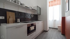 Apartament | 1 dormitori, planxa i posts de planxar i wifi