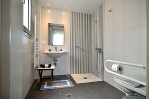 Bathtub, hair dryer, towels