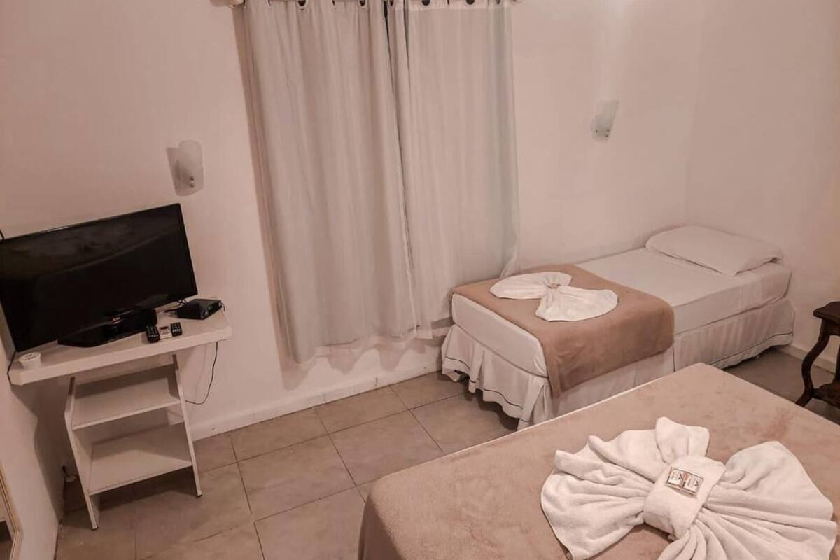 Quarto quádruplo standard | Wi-Fi de cortesia, roupa de cama