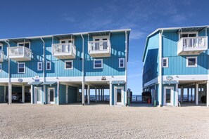 A beachfront building with multiple balconies and a covered entrance area. - Beachfront, Bayview, Relax ~ Edgewater Retreat (Cape San Blas)